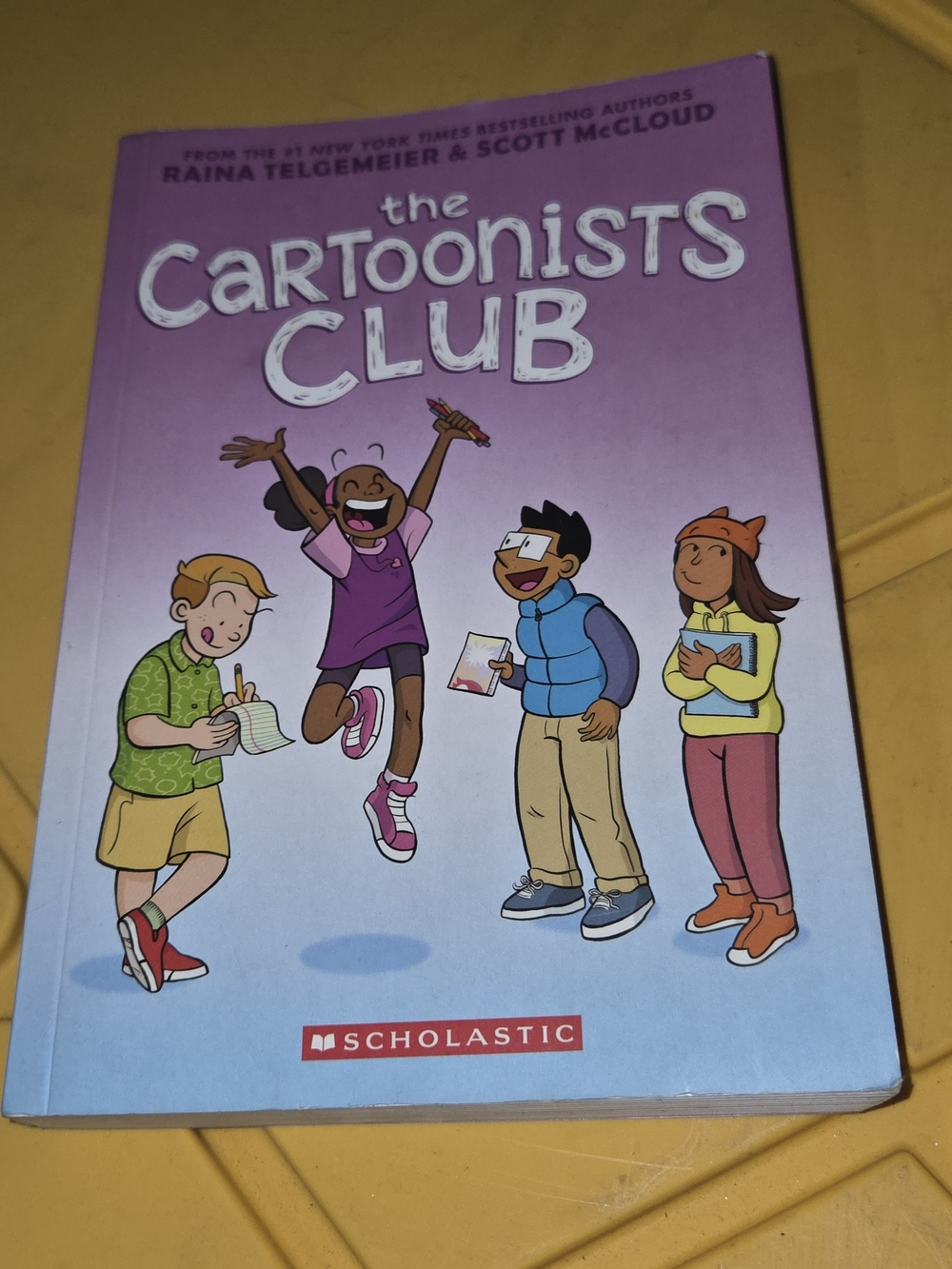 Scholastic Pink, Purple and White Kids Book